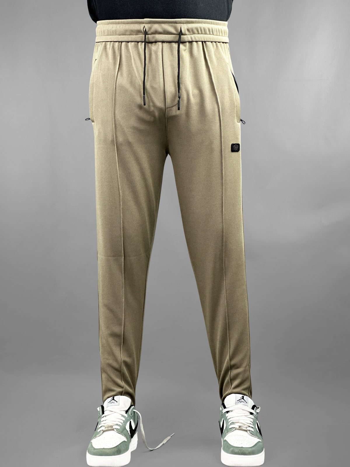 Beige Textured Casual Trousers with Zip Pockets