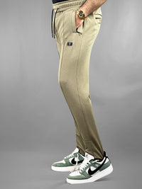 Beige Textured Casual Trousers with Zip Pockets